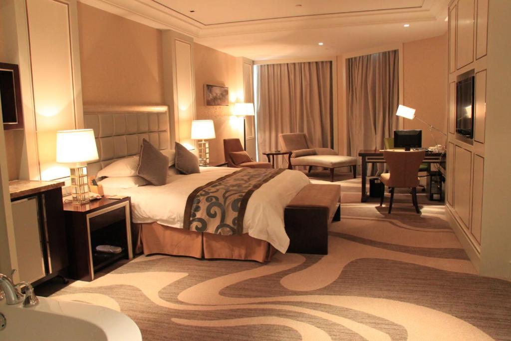 Landison Green Town Hotel Xinchang Phòng bức ảnh